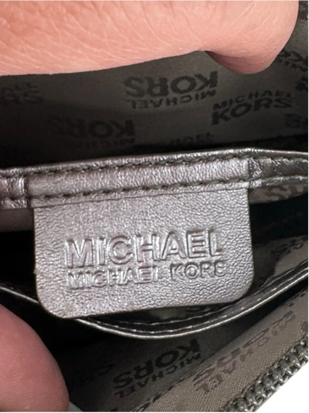 Michael Kors Metallic Gunmetal Embossed MK makeup pouch compartments charm